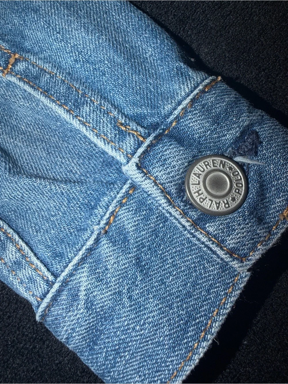 Ralph Lauren Polo Light Blue Denim distressed Jacket. Polo print on the back.